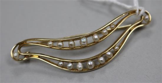 A 14ct gold and cultured pearl set brooch, 56mm.